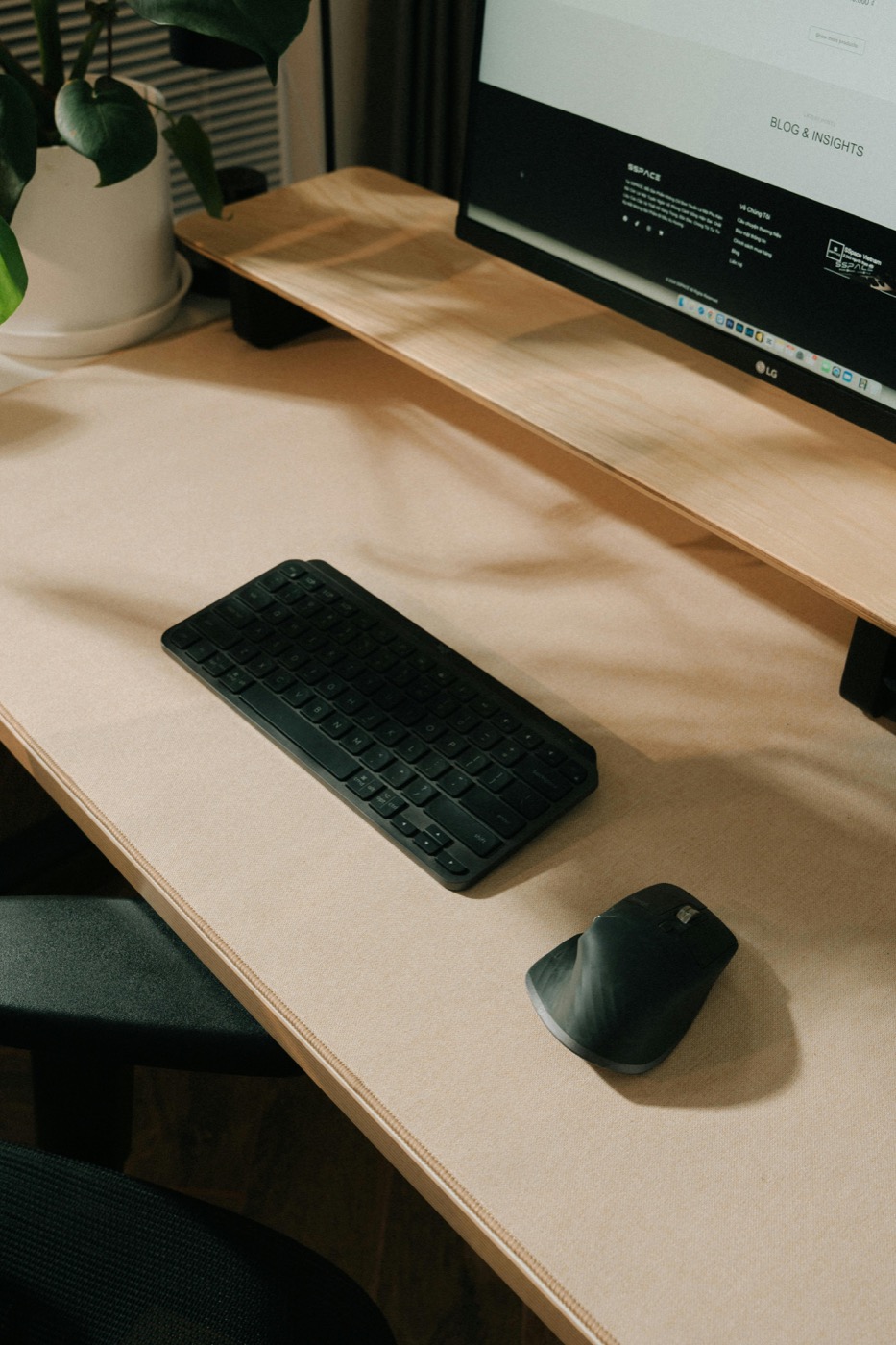 Mouse and keyboard on a wooden work surface