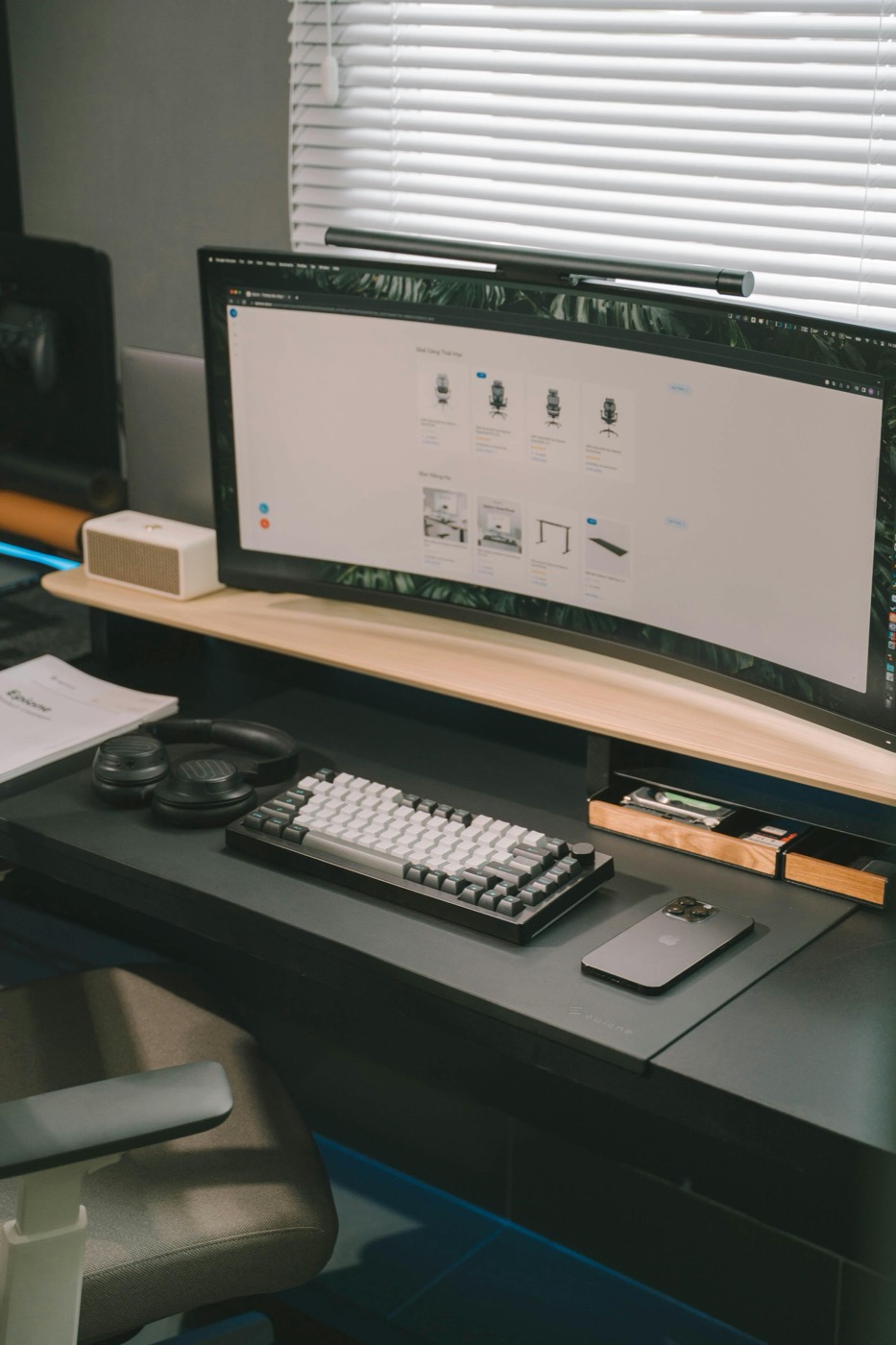 Desk setup with monitor and audio-friendly workspace layout