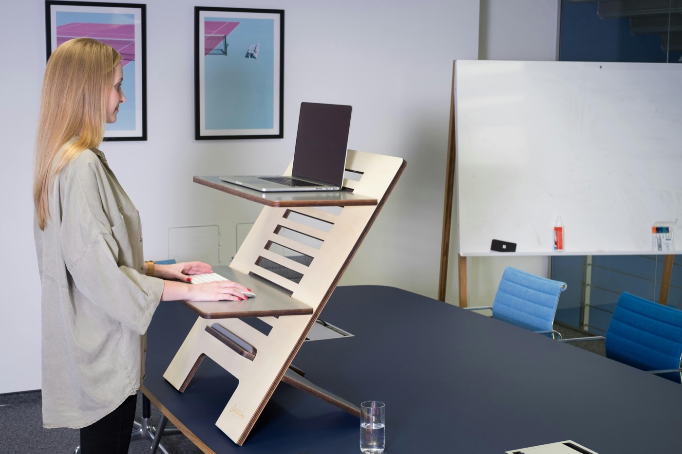 Standing desk setup showing keyboard-height posture context